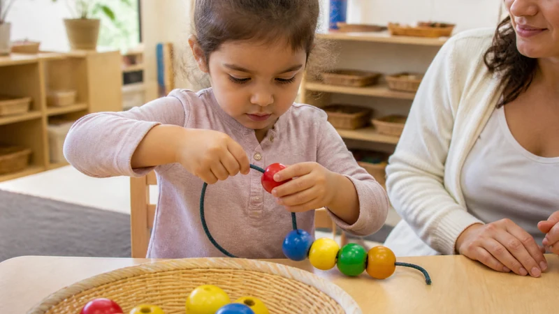 20 Fine Motor Activities For Preschoolers That Build Real Classroom Skills 4 Preschooler Threading Large Colorful Wooden Beads Onto A Thick Cord